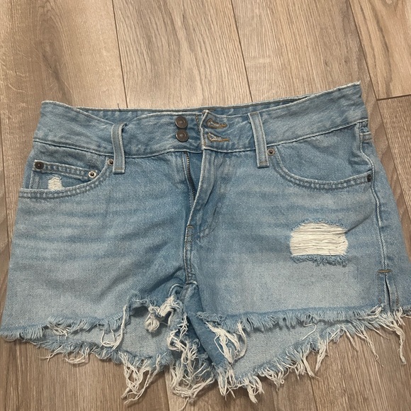 Levi's Pants - Levi's “Superlow Shorts” Light Blue Distressed Jean Shorts